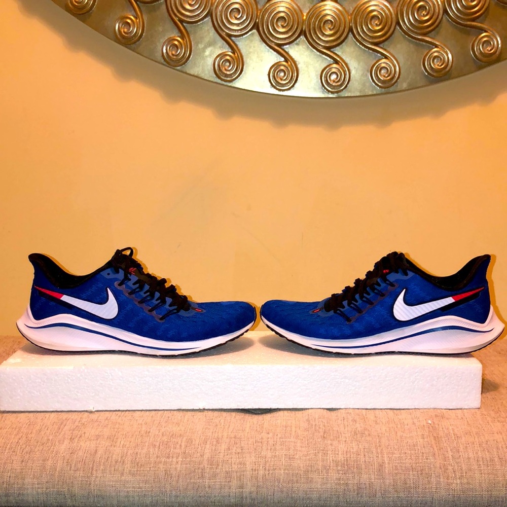 Men’s blue Nike with red and white swoosh